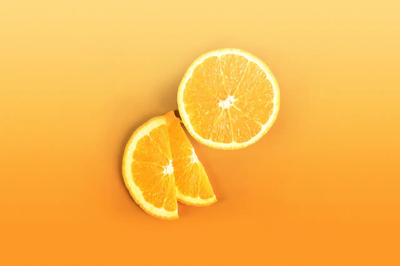 Oranges on yellow-orange background